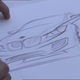 Illustration for article titled Watch BMW Designers Labor Over The Ugliest Car Theyd Ever Make